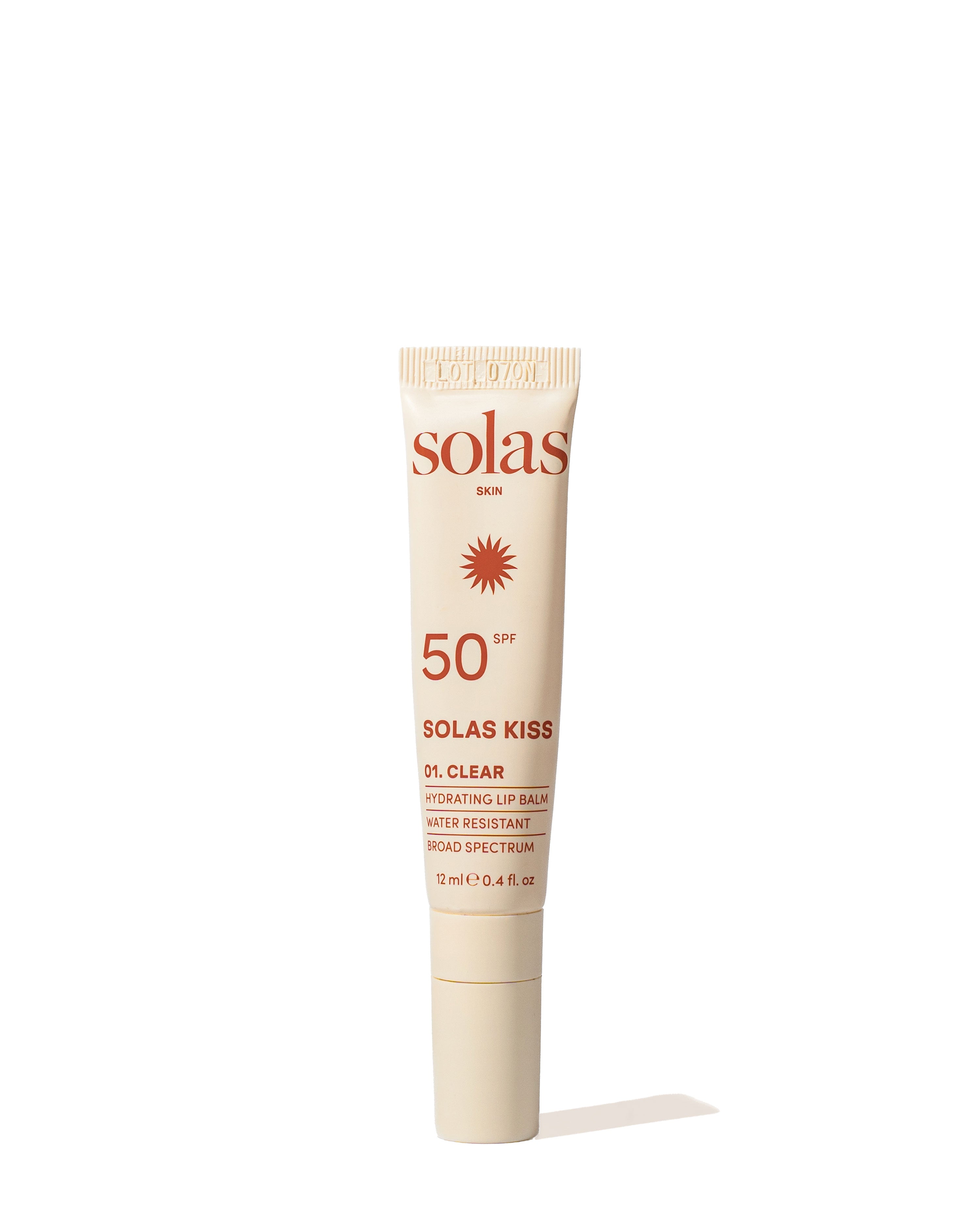 Solas Kiss lip balm tube on a white background