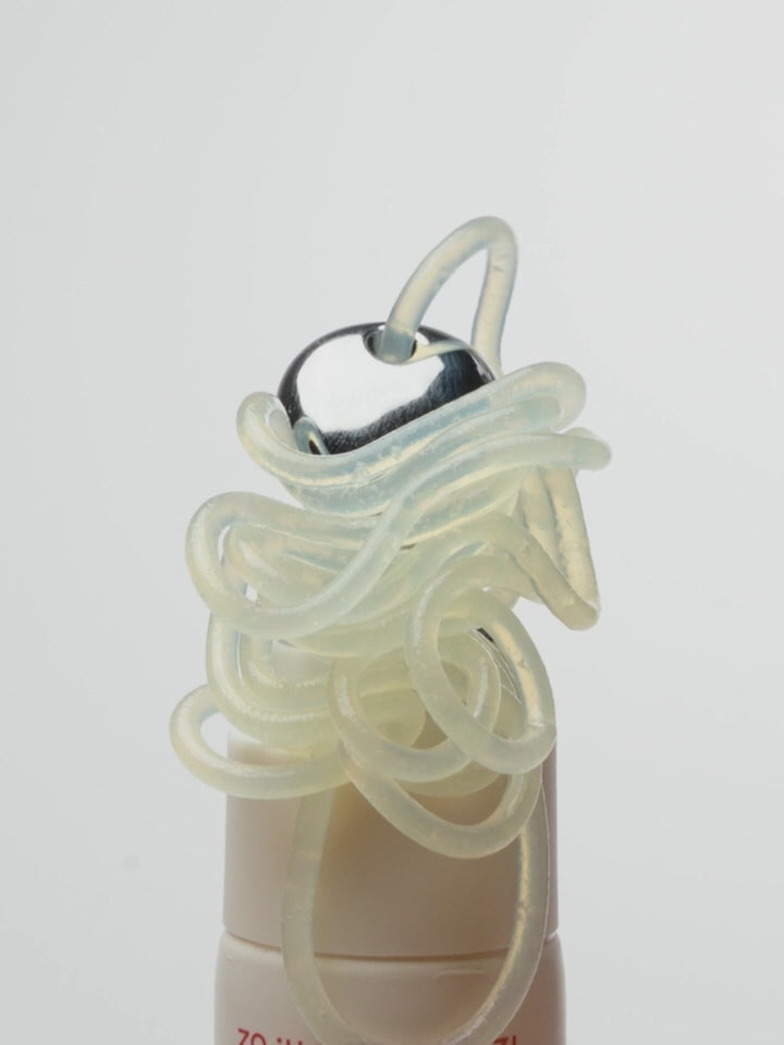 Detail shot of Solas Kiss product being squeezes out of tube from metal tip applciator